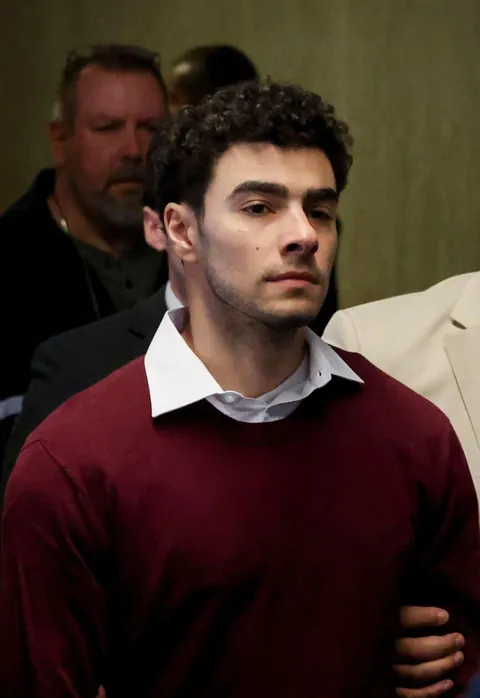 Luigi Mangione arrives at Manhattan Criminal Court in New York City. (December 23, 2024) 