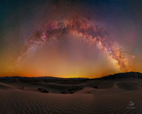 I took 59 images of the Milky Way and stitched them together to produce this 250 megapixel rainbow pano as it rose over the sand dunes of Death Valley. Zoom link in the comments [OC]
