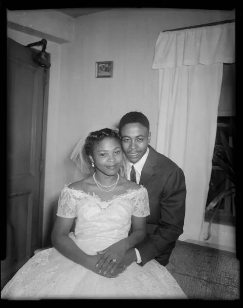 Young couple pose for their wedding photos, Pittsburgh, Pennsylvania, 1959.