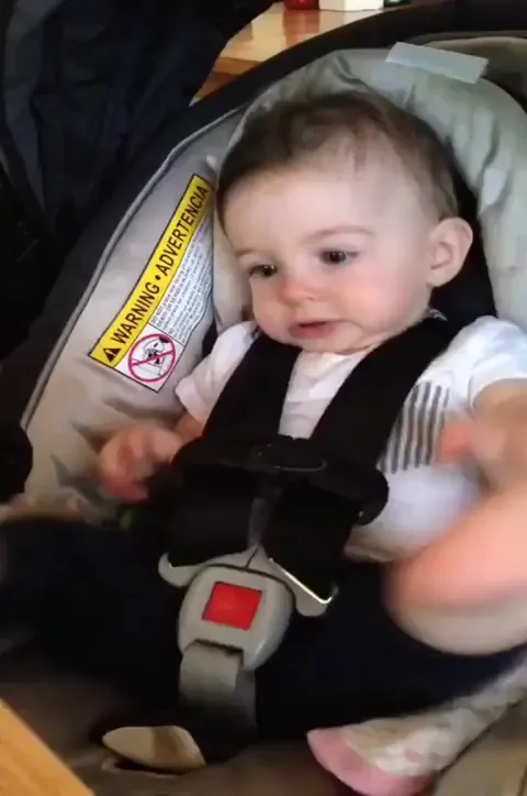 When the baby realizes he owns a leg