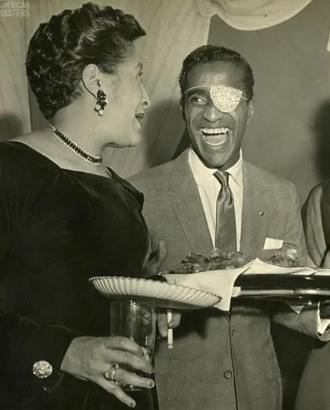 Sammy Davis Jr throws a party (1954). Sammy had just lost his eye in a car accident and had to wear an eyepatch, so others joined in. You may recognize some other famous faces.