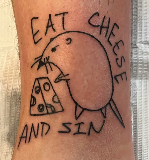 Eat Cheese and Sin, by Reuben Garcia at Zodiac Lines in Grand Rapids, Michigan