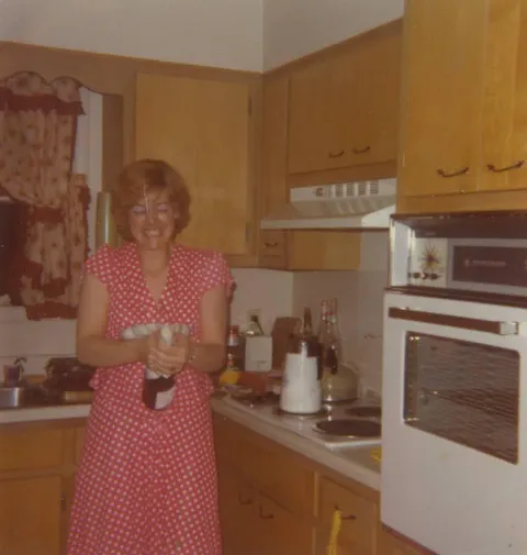 My mom in her first apartment, 1976
