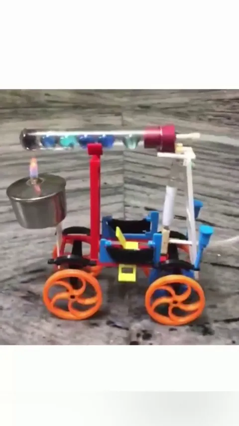 Stirling engine Car built using Marbles, bearings and 3d printed plastic