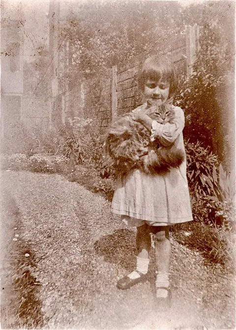 My mom with her cat (late 1930s)
