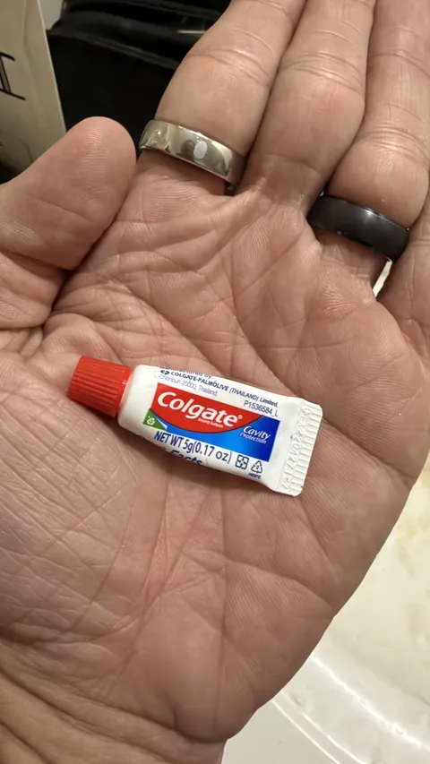 The size of this complimentary toothpaste.