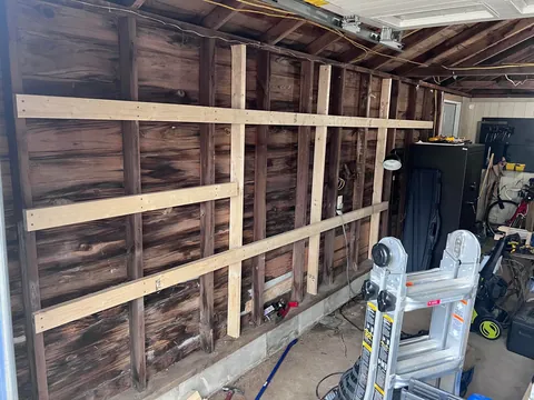 Completed a weekend project! Shelves and a workbench built into my garage.