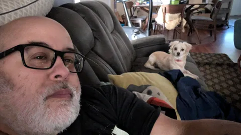 Meet my new fren Maui. His howls sound like a whistle, but it's a mighty howl. He doesn't quite trust me yet.