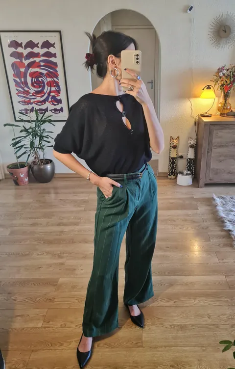 Black knit + green pinstripe pants