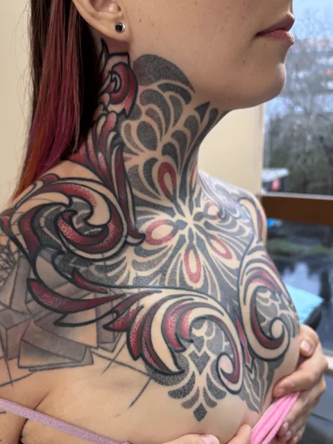 Healed neck/chest piece!! Tattoos by Jess Ward in Portland, OR