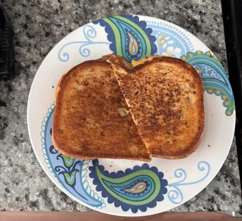 My wife thinks I'm crazy for cutting my grilled cheese this way; am I nuts or is this not a normal thing to do? Lol