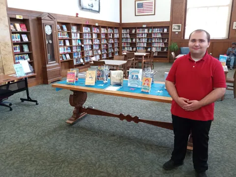 I'm an intern at my local library and I'm proud of my job