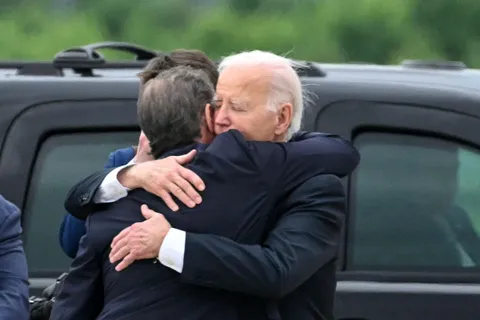 President Biden hugging his son, Hunter, after he was convicted. Joe promised not to pardon him.