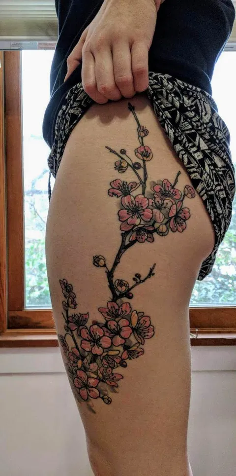 Cherry blossom tattoo by Cecilia Wingate, Seven Son Tattoo, in San Francisco, CA
