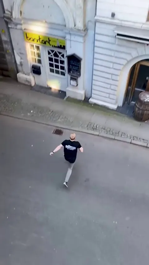 This dude is climbing buildings like spiderman