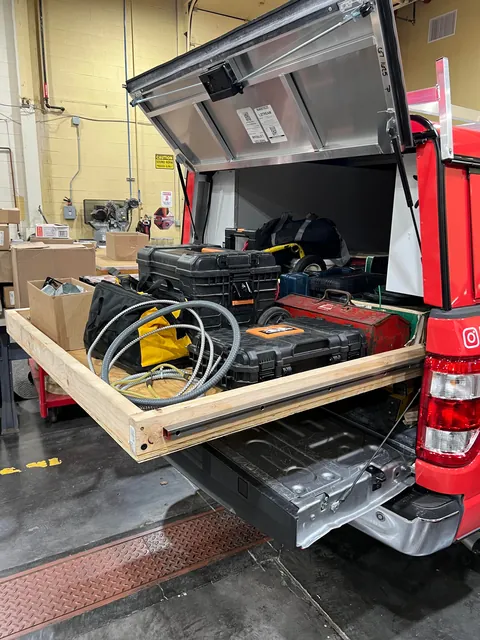 I built a custom bed slider for my new work truck.