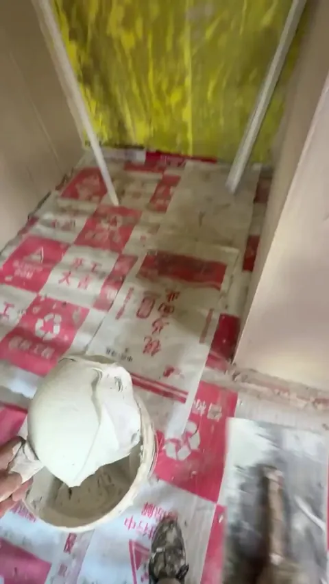 The smooth application of wall putty