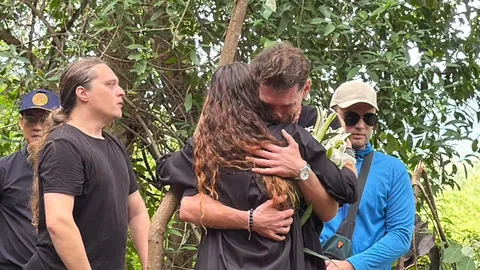 Russian Family Holds Buddhist Memorial Ceremony at Site Where Bodies Were Found