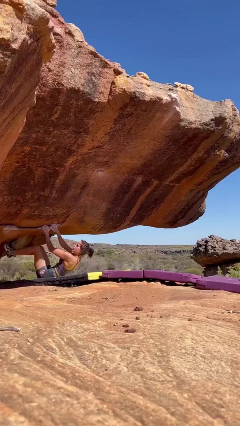 Oriane Bertone climbing Black Velvet (V11/8a) in South Africa