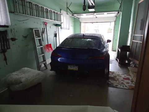Its not much but I can finally park my car inside!