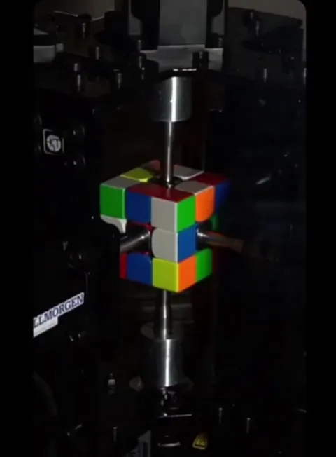 A rubik's cube was solved in just 0.103 seconds by a robot built by Purdue students