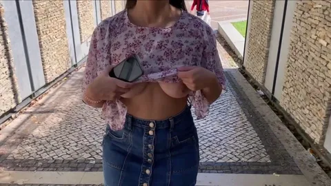 I like flashing my tits outside