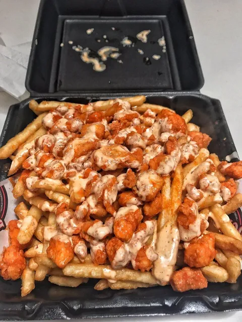 Mozzarella fries topped with boneless hot buffalo wings [OC] [900 x 1200]