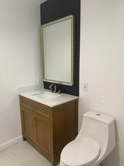 3 year garage/studio apartment build, cost ~$70,000 and one marriage