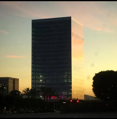 The way the side of this building reflects the sunset.