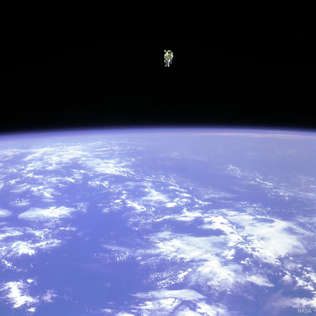 Astronaut Bruce McCandless II floats untethered away from the space shuttle, with nothing but his Manned Maneuvering Unit keeping him alive. The first person in history to do so.  (NASA)