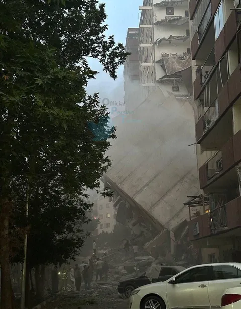 The fall of a residential building in Tehran.