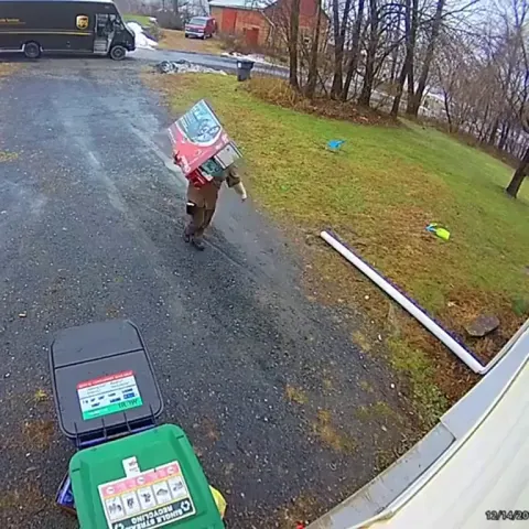 UPS driver really goes the extra mile to protect a customer’s package! Incredible