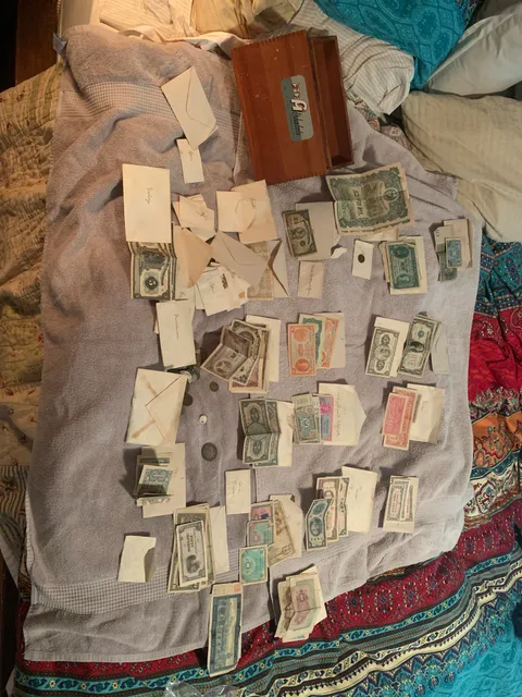 I run down an old dirt road. Trash is dumped there. One day I stopped and found a box of money. All the envelopes are different countries all over the world. Mostly date from the 1700s-1900s. The oldest is a coin from 1621. I’ve got some from countries that no longer exist. I’m still researching.