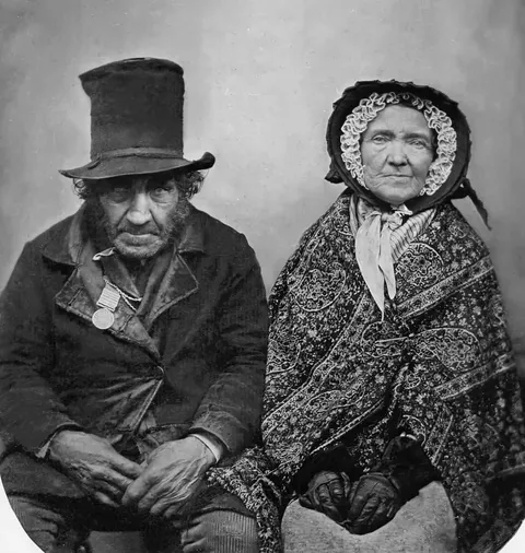 A British veteran of the Napoleonic wars posing with his wife, 1850.
