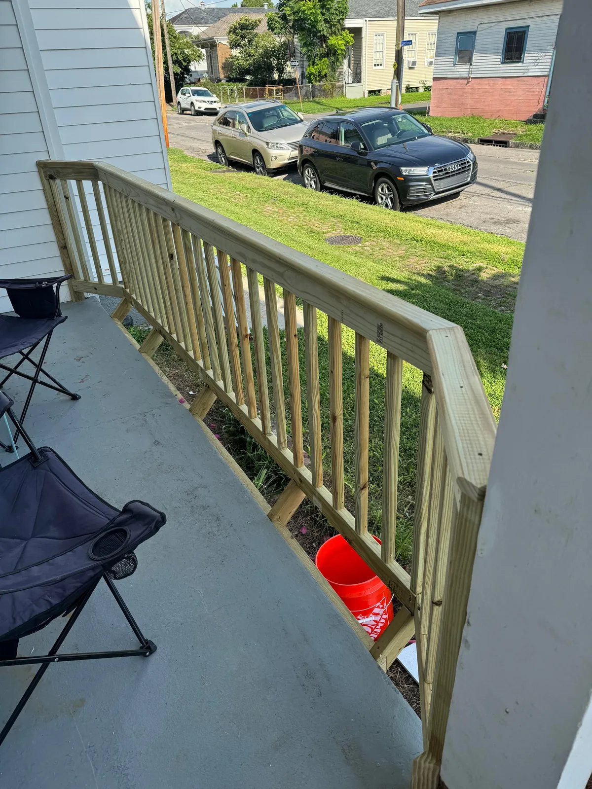 Extended the railing for more front porch space by
