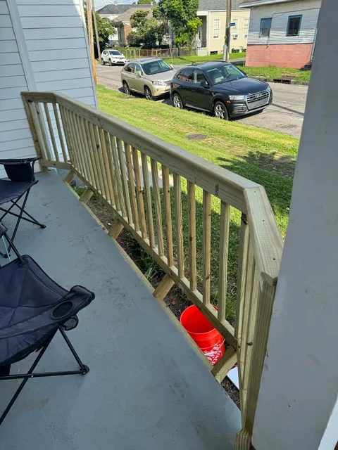 Extended the railing for more front porch space by