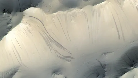 Mars’s mysterious slope streaks AREN'T SIGNS OF WATER after all!