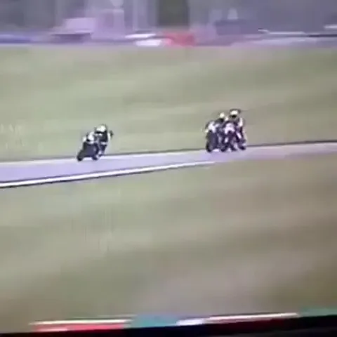 Racer realizing his bike has split in half.