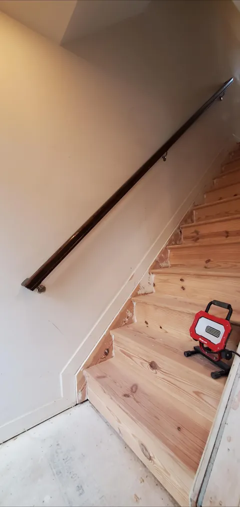 Carpeted pine stairs → sanded and stained wood (first woodworking project from start to finish)