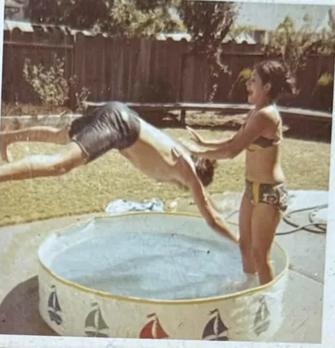 Backyard pool fun, no diving allowed, 1960s