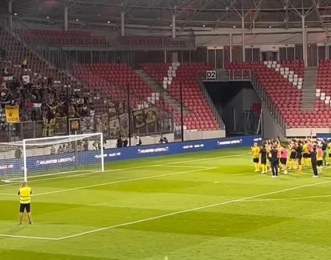 Multiple Palestinian flags in the stands of AEK fans after knocking out Hapoel Beer Sheva in the 2nd qualification round of the Europa Conference League