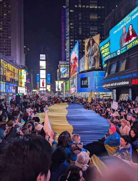 Crowd unfurls a Ukrainian flag at Times Square March 1st 2025