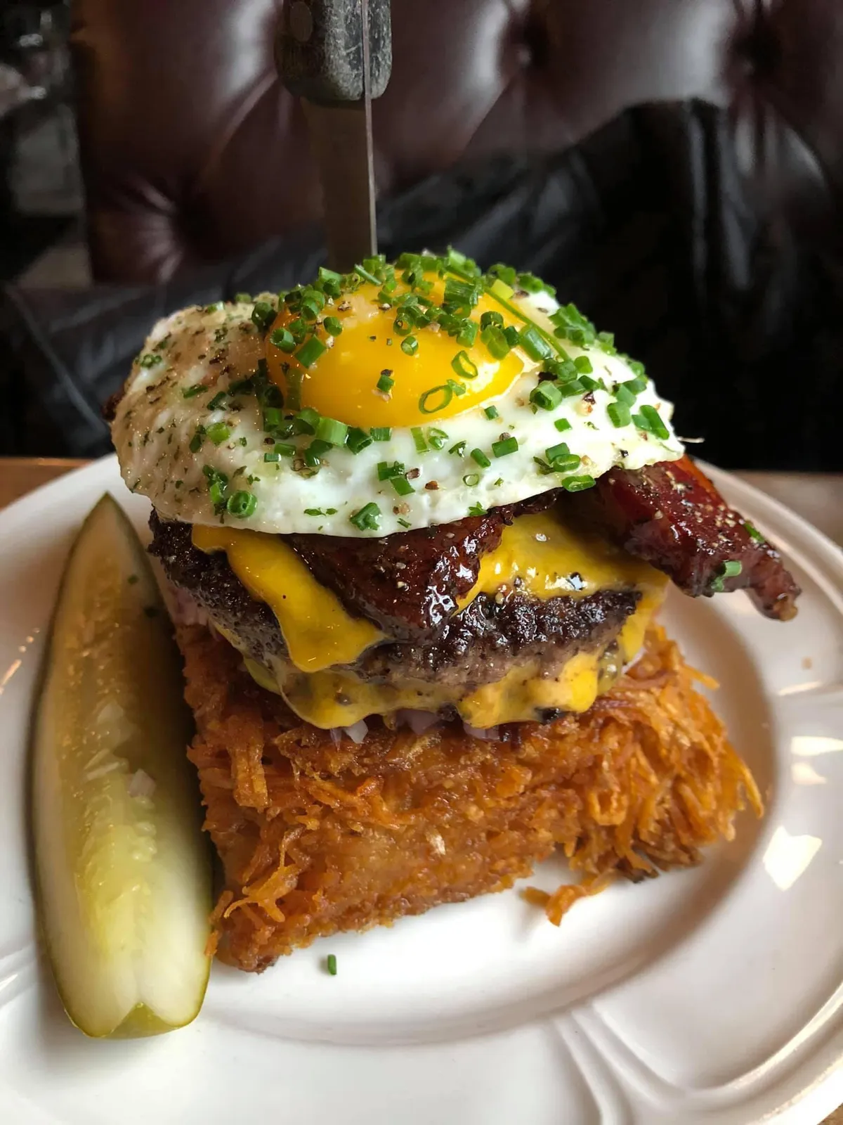 [OC] Au Cheval bacon cheeseburger with a fried egg on crispy hash browns 
