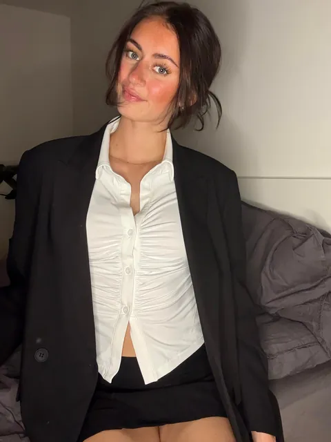 The average secretary just loves showing off her assets