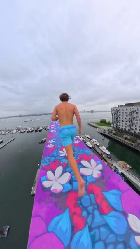 Braden Rumpit jumping off an 89ft platform in Boston