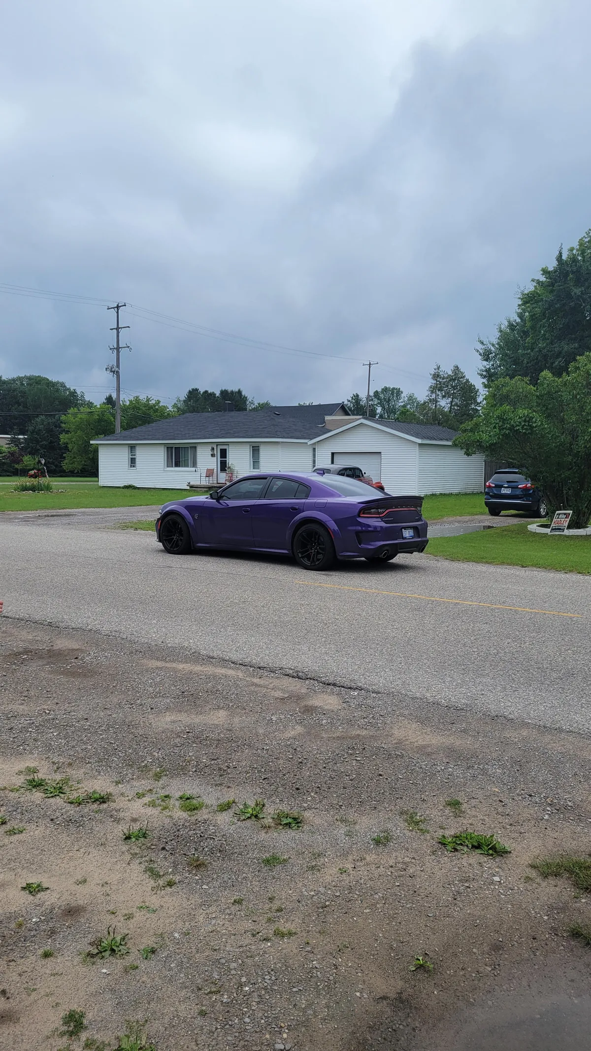 Someone abandoned their $80k car in the road at the end of my neighbor's driveway