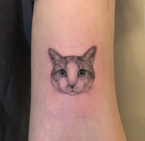 First tattoo is of my kitty! By Zeke @ Chronic Ink, Toronto