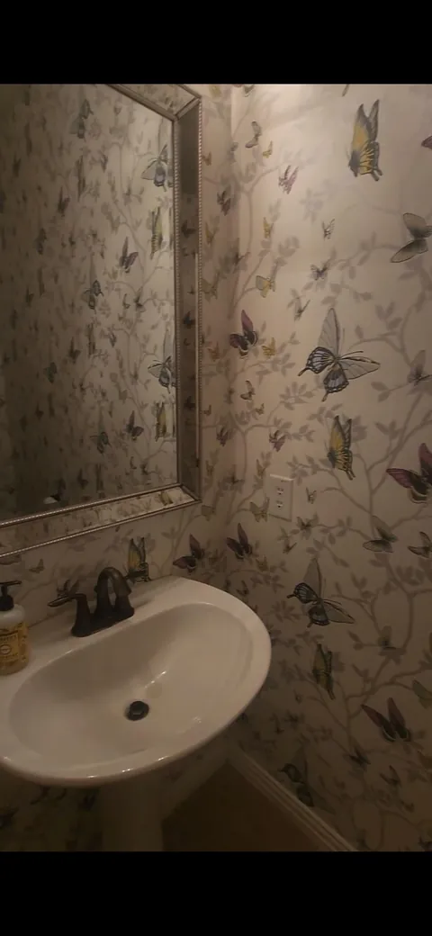 Update: Laid a full wall of herringbone tile wrong. Now what?