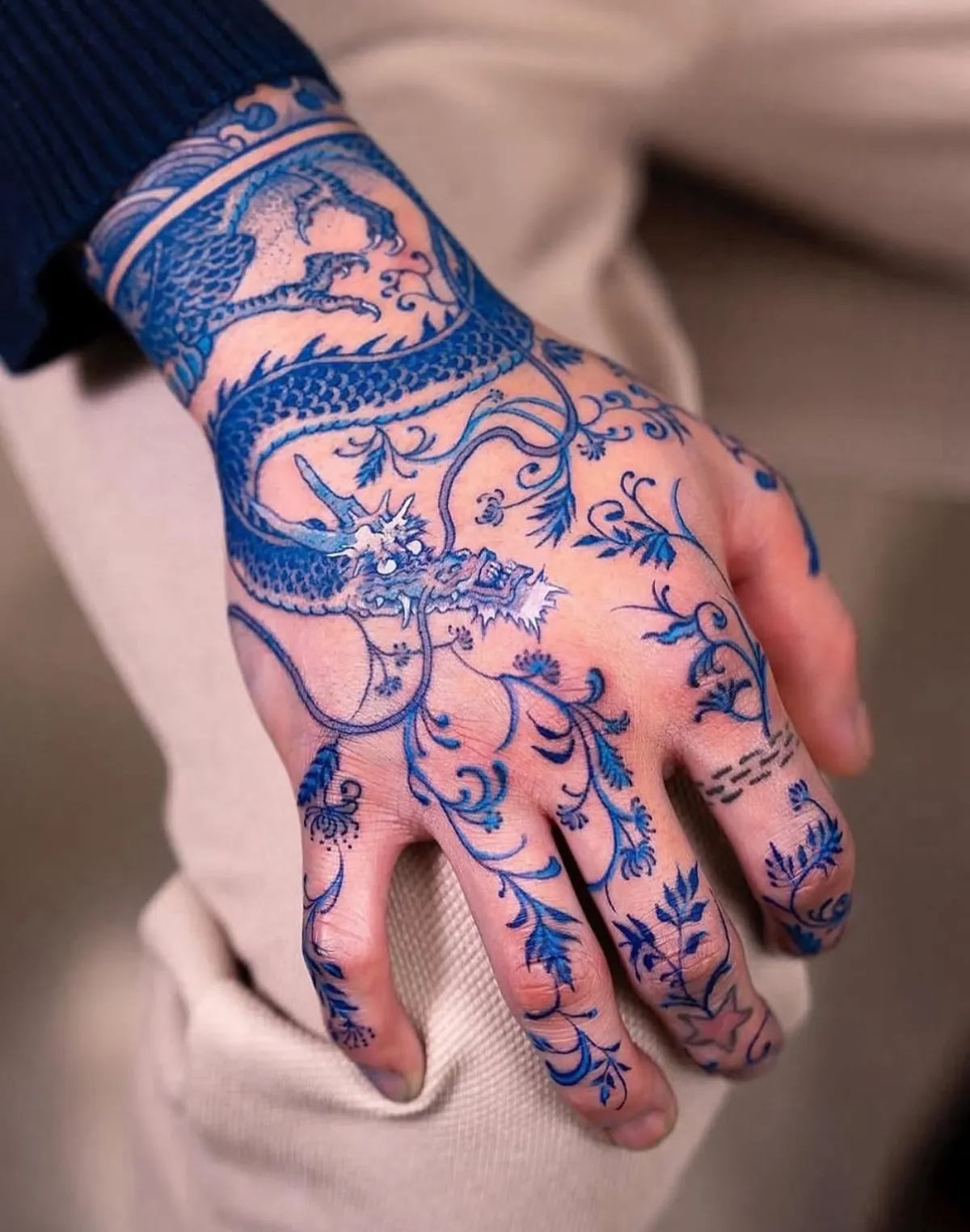 Tattoo artist turn skin into Porcelain inspired Art