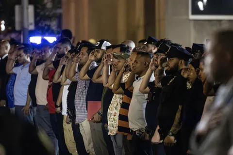 (OC) Mourners attend dignified transfer for NYPD officer killed in NYC high-rise shooting